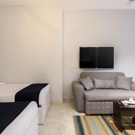 Travelholic Residence Golden Gates Kaherah Luaran gambar