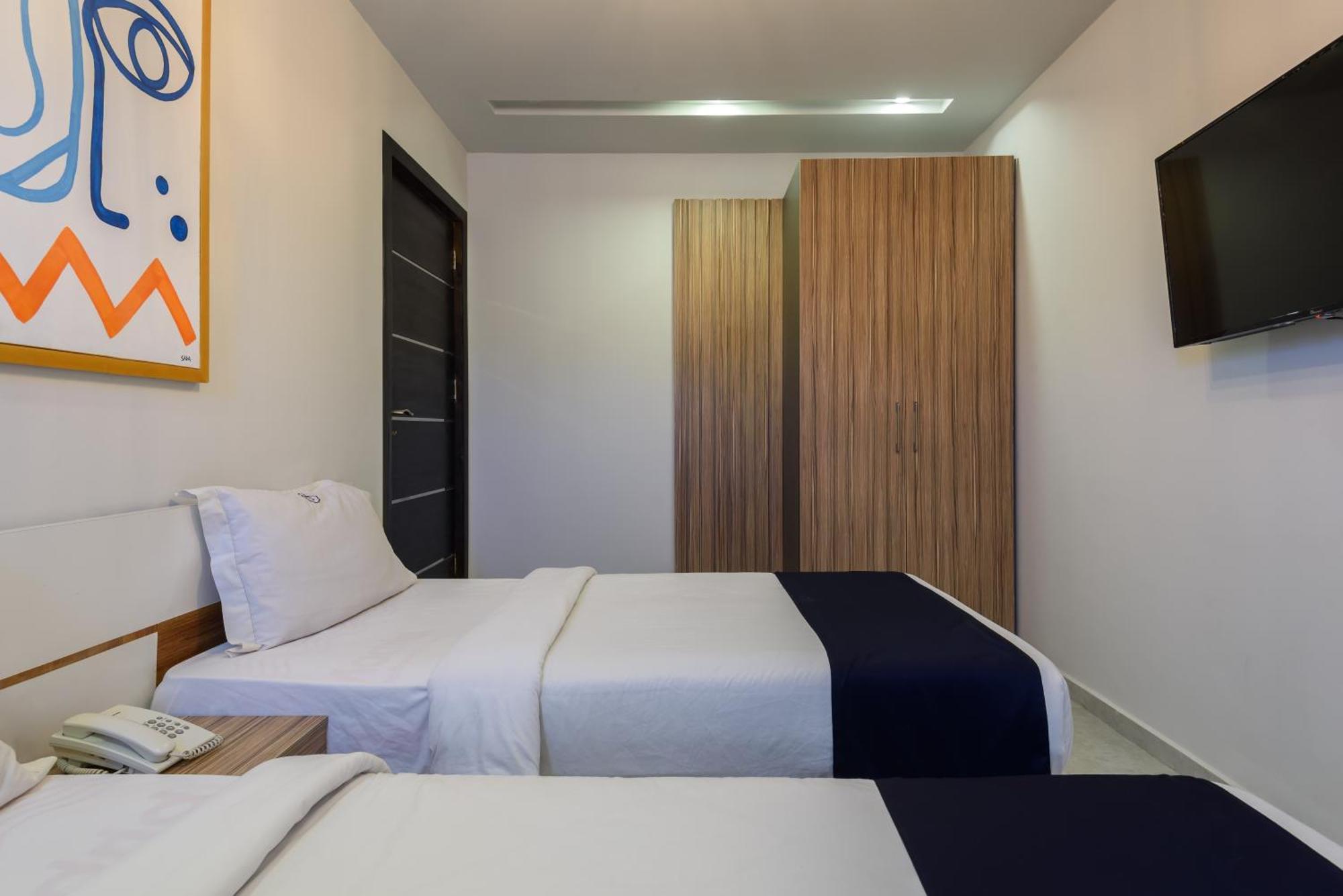 Travelholic Residence Golden Gates Kaherah Luaran gambar