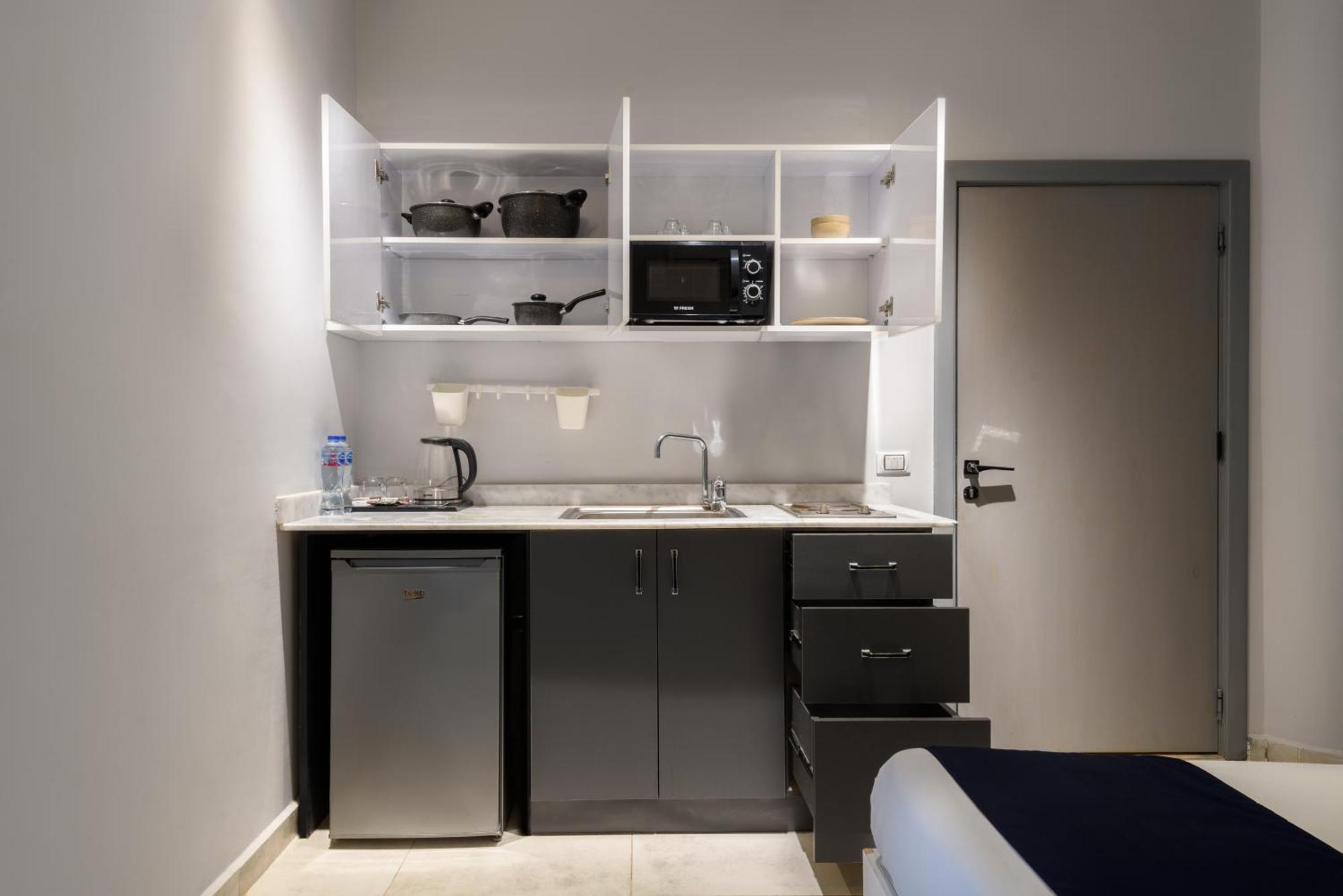 Travelholic Residence Golden Gates Kaherah Luaran gambar