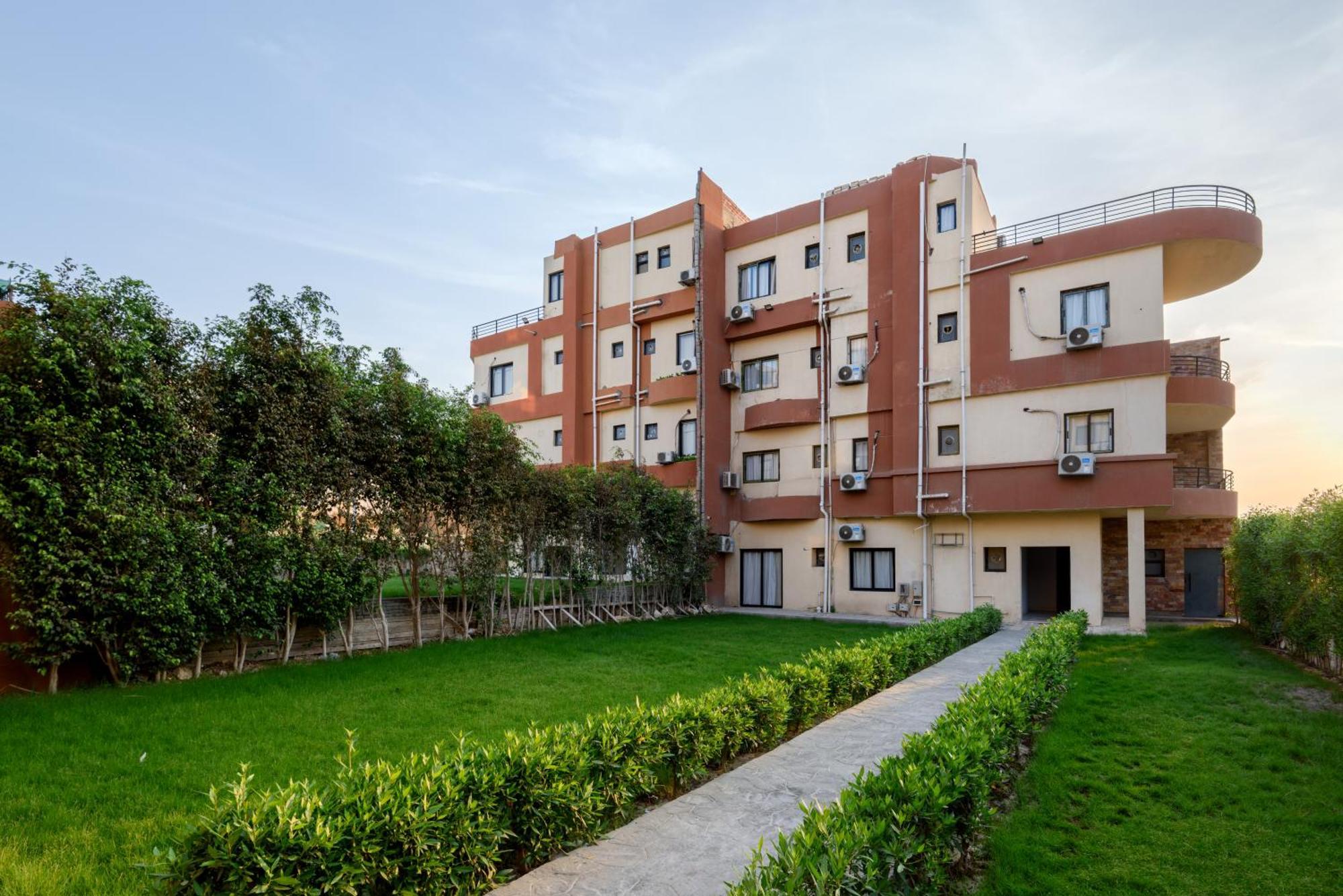 Travelholic Residence Golden Gates Kaherah Luaran gambar