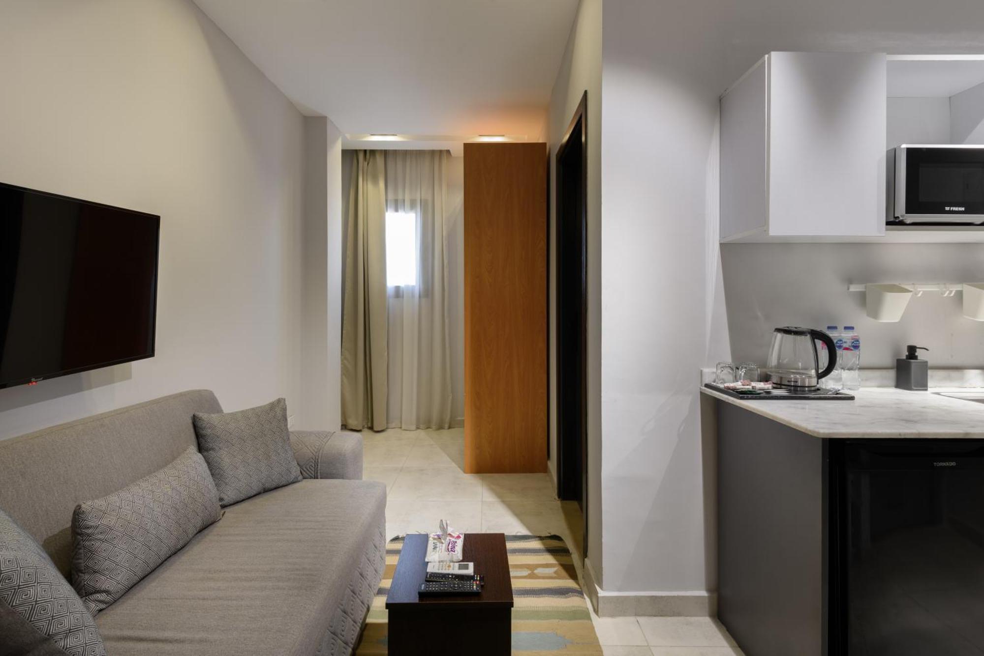 Travelholic Residence Golden Gates Kaherah Luaran gambar