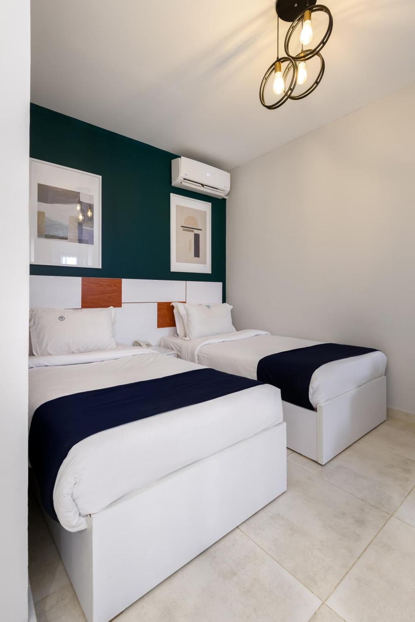 Travelholic Residence Golden Gates Kaherah Luaran gambar
